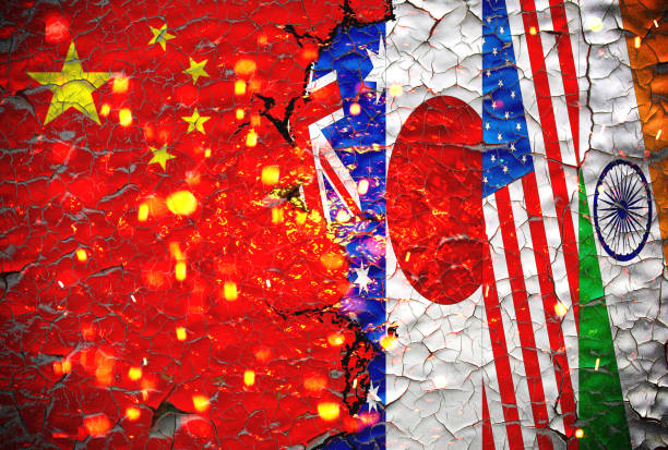 istock Grunge china vs australia, japan,us,and india national flags icon pattern isolated on broken cracked wall background, abstract international political relationship friendship divided conflicts concept wallpaper.quad plus countries flags vs china. 1318812486