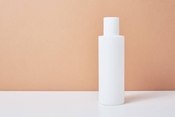 istock White cosmetics mockup on beige background 1318813928