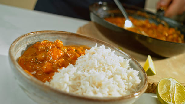 istock Chickpea curry and rice served in bowl 1318814449