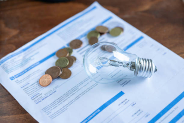 Light bill with light bulb stock photo
