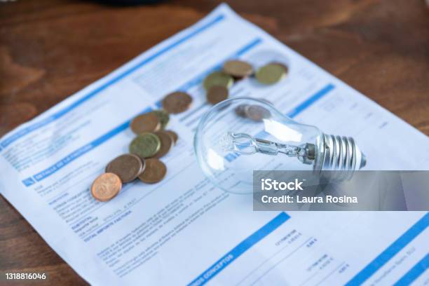 Light Bill With Light Bulb Stock Photo - Download Image Now - Financial Bill, Lighting Equipment, Price
