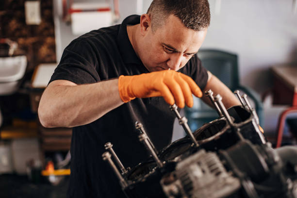 istock Male motorcycle mechanic working 1318816114
