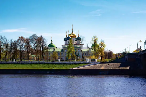 TVER, Russia, May 2021: View of the Imperial Travel Palace and the church in Tver. The embankment of Stepan Razin in Tver.