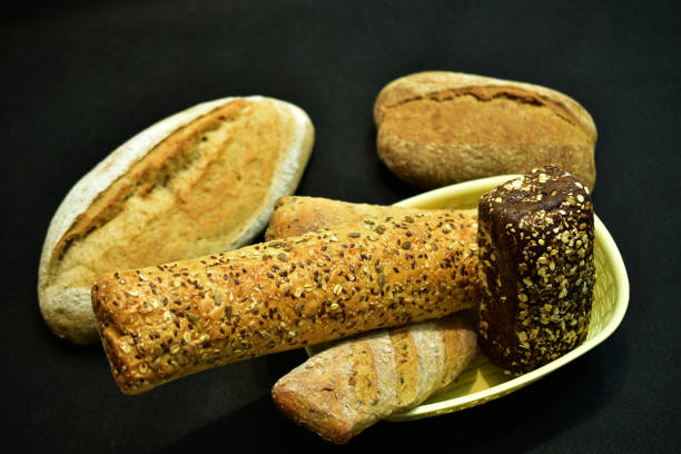 istock A set of different loaves lies on the table surface. 1318819367