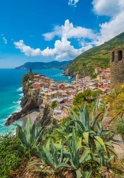 Vernazza, Italy - 7 July 2020 - The famous coastline in Liguria region, with Five Lands villages part of the Cinque Terre National Park, UNESCO World Heritage Site. Here a view of Vernazza with the cityscape.