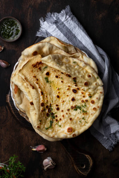 istock Indian Naan Flatbread made with butter and dill 1318819535