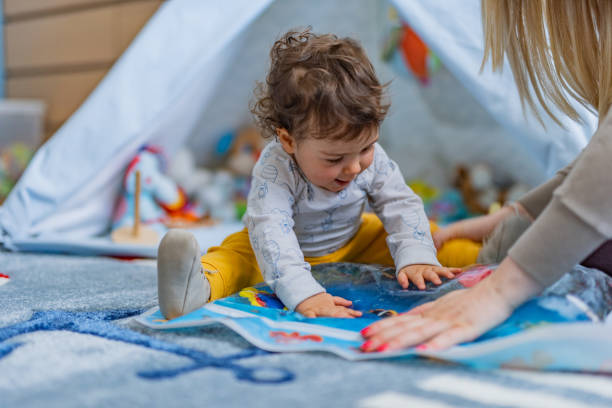istock Happy boy playing whit his mother at home 1318821062