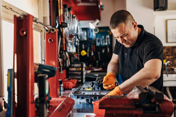 istock Busy mechanic in his workshop 1318821350
