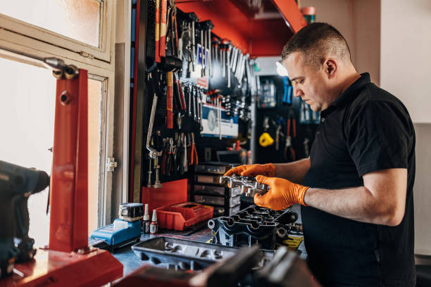 istock Busy mechanic in his workshop 1318821479