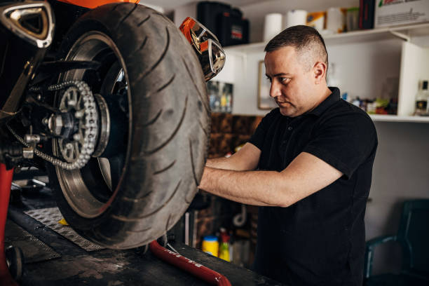 istock Mechanic repairing motorcycle 1318822807