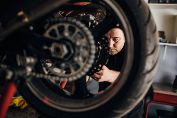 istock Mechanic repairing motorcycle 1318822835