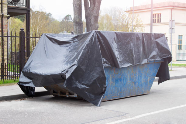 istock Large container covered with black plastic foil for dust contamination protection 1318824541