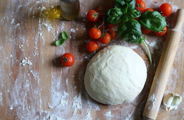 istock Homemade pizza dough. 1318824884