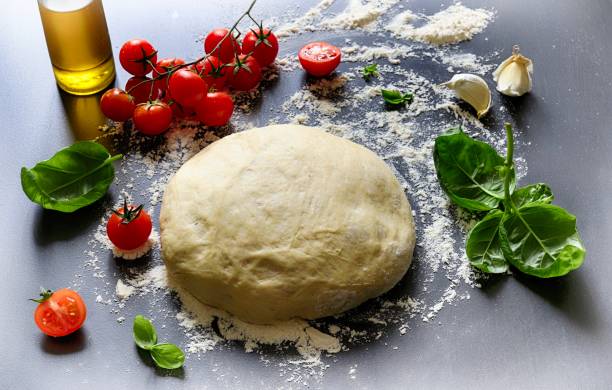 istock Homemade pizza dough. 1318824886