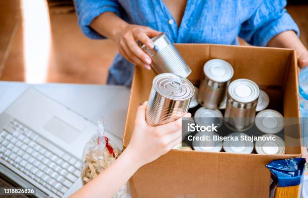 Cardboard Box Packing With Canned Food Donations Stock Photo - Download Image Now - Food Drive, Can, Food Bank