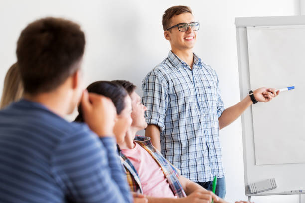 istock group of high school students with flip chart 1318828129