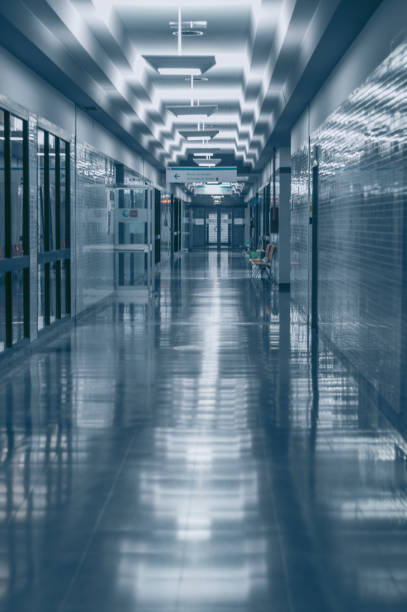 istock empty modern hospital corridor in coronavirus time 1318828267
