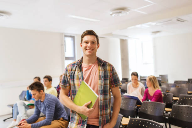 istock group of smiling students in lecture hall 1318828313