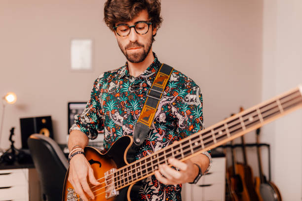 istock Young man playing an electric guitar 1318829545