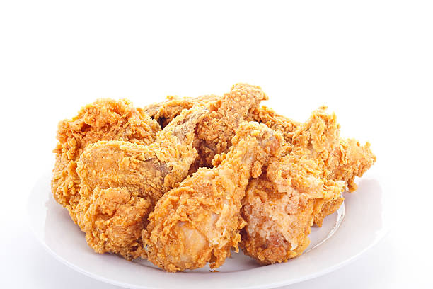 istock Crisp Juicy Fried Chicken on a White Plate 131882966