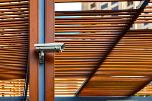 istock Security CCTV camera on facade of building 1318829673
