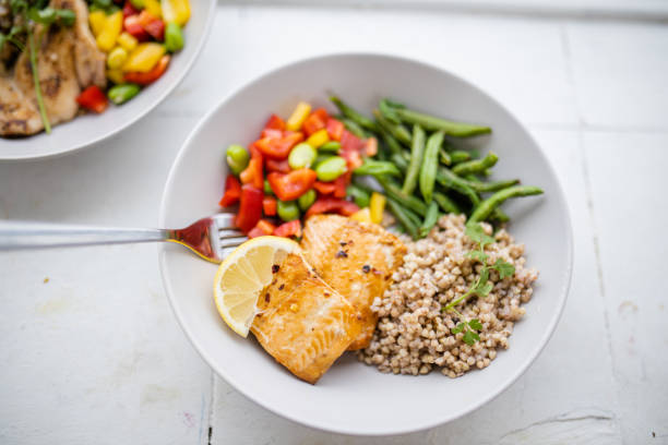 istock Salmon and buckwheat dish with green beans and tomato 1318831917