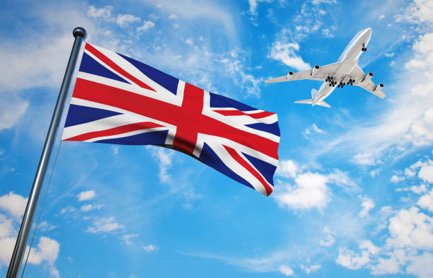 uk flag with airplane - british flag freedom photography english flag imagens e fotografias de stock
