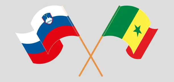 Vector illustration of Crossed and waving flags of Slovenia and Senegal
