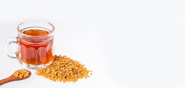 istock Fenugreek and water seeds - Trigonella foenum - graecum. Text space 1318837790
