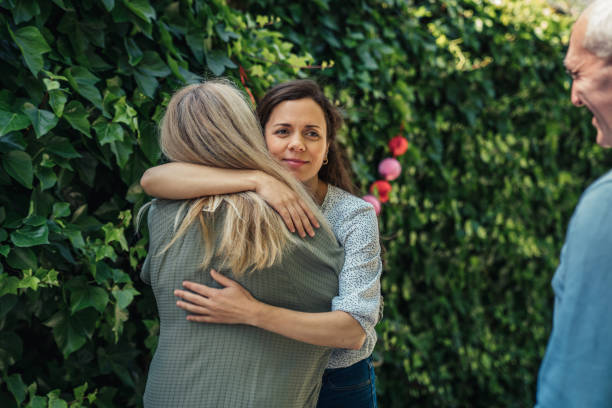 istock Man embracing father at birthday party 1318839035