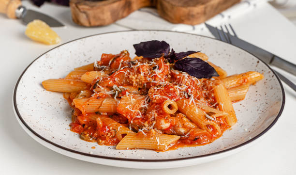 istock Vegetarian pasta with eggplant 1318839095