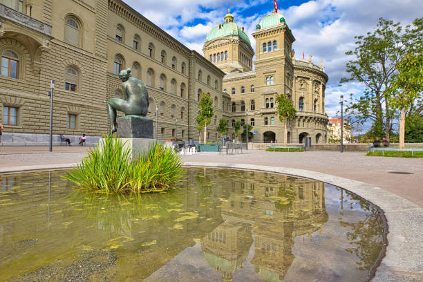 Swiss Parliament building Bern Bern, Switzerland - Aug 23, 2020: Parliament building fountain or Bundeshausthe houses the Swiss Federal Assembly and Council. Landmark of historical town Bern, Capital of Switzerland. Bern Canton. unesco organised group stock pictures, royalty-free photos & images