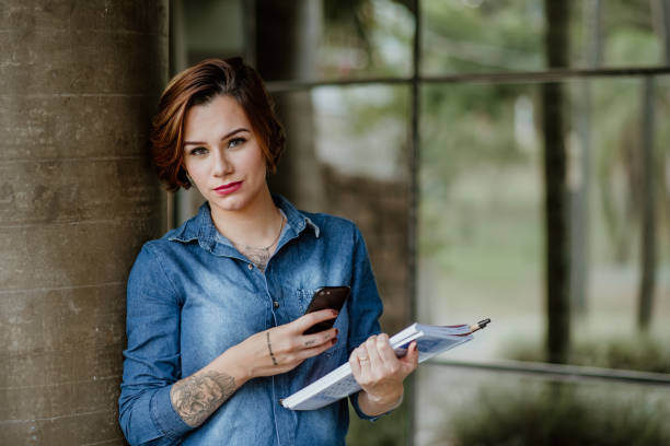 istock Young Adults lifestyle - Student using mobile phone 1318856139