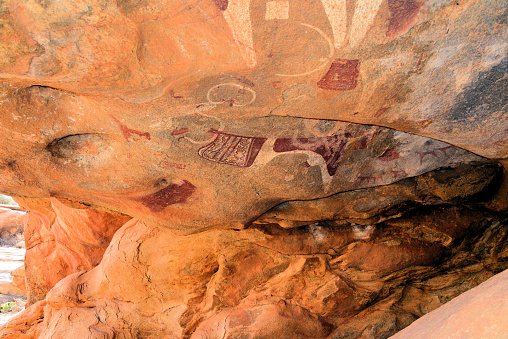 Laas Geel, Maroodi Jeex region, Somaliland, Somalia: domesticated aurochs and dogs painted in the ceiling of an open air rock alcove in a red granite rock massif near Hargeisa - some of the earliest and best-preserved art works known in the Horn of Africa and on the African continent as a whole, dated between 4000 BC and 3000 BC.