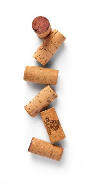 Whine corks Wine corks isolated on white cork stopper stock pictures, royalty-free photos & images