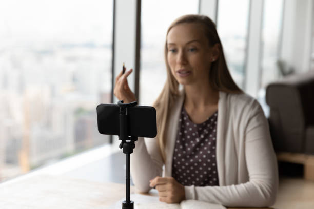 istock Modern smartphone shoot female coach shoot live 1318858302
