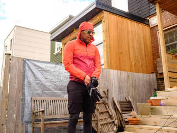 istock Black man exercising in back yard 1318859223