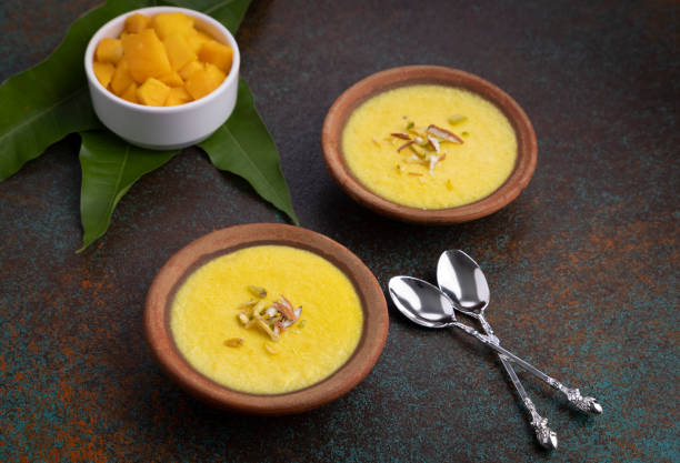 istock mango-flavored Phirni served in earthen plate 1318860966