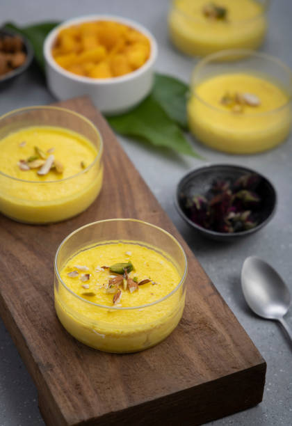 istock mango-flavored Phirni served in glass bowls 1318861062
