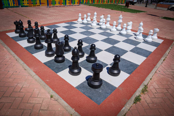 istock Chess in the park sculpture gambit 1318863105