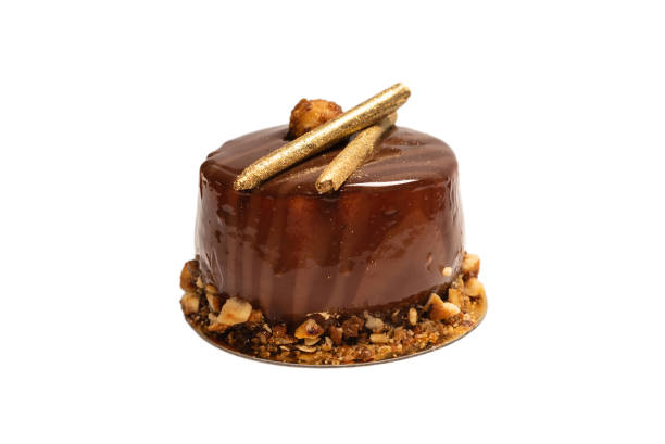 istock Chocolate and caramel cake isolated on a white background. 1318864478