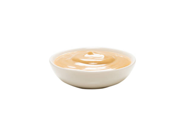 istock Mushroom sauce in a bowl isolated on white background. 1318864544