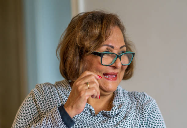 istock Senior Hispanic woman headshot 1318865879