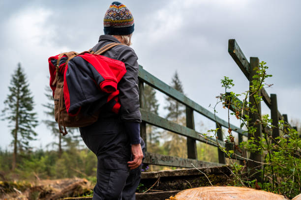 istock Active retired man stepping onto a footbridge 1318866058