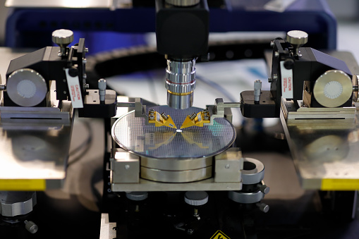 Silicon semiconductor wafer on RF probe station. Selective focus.