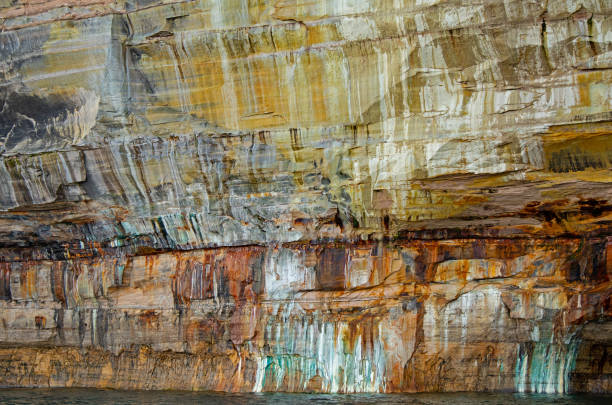 istock Mineral Stained Cliff Pictured Rocks 1318867615