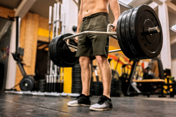 muscular shirtless man performing deadlift with trap bar - shirtless energy action effort imagens e fotografias de stock