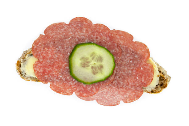 Salami sausage bread from above against a white background