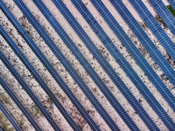 istock Aerial view of solar panel base in desert 1318872945