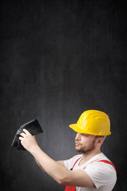 istock Portrait of a poor construction worker 1318875353
